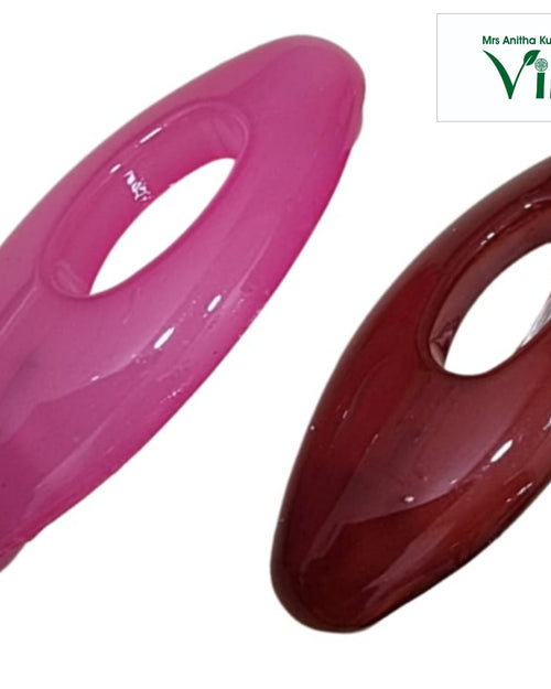 Pair of oval saree pins with centre openings in pink and maroon