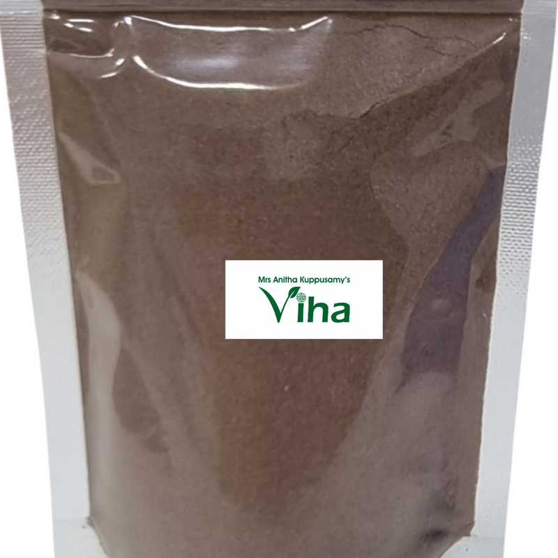 Rose Petal Powder, a clear plastic stand-up pouch containing brown powder with a rectangular white label affixed centrally featuring green text