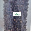 Organic Cloves in a clear plastic pouch containing dark dried cloves