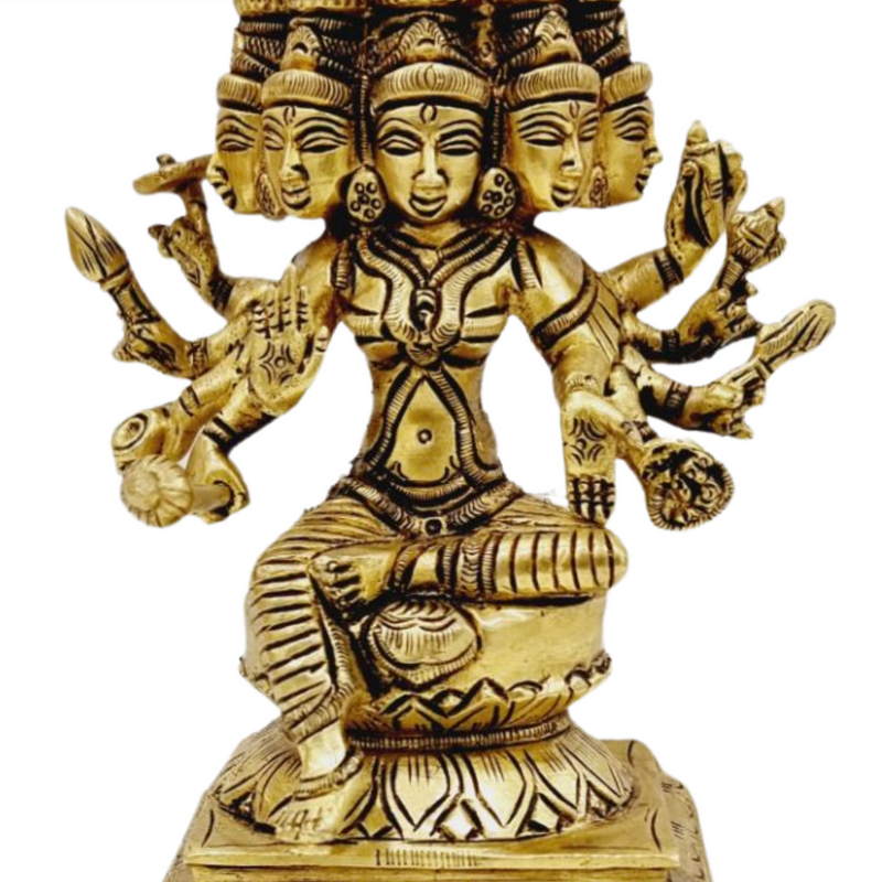Gayatri Devi in brass, many-headed and many-armed figure seated on a lotus over a stepped square base