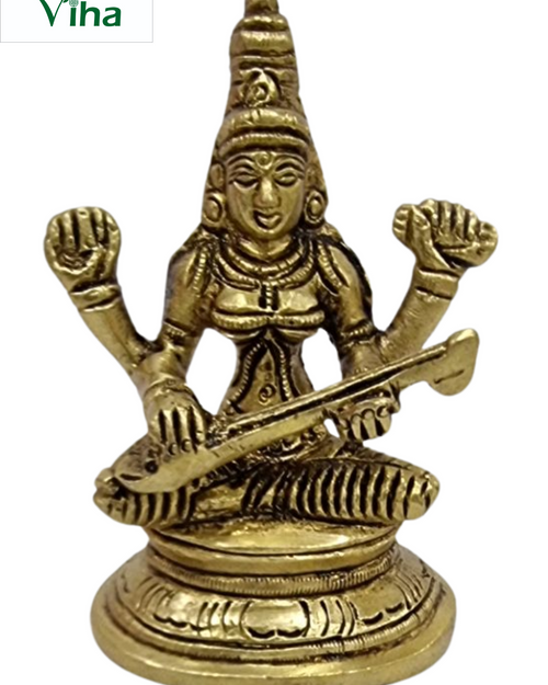Saraswathi in brass, four-armed figure with a tall pointed crown seated on a round drum base with a veena