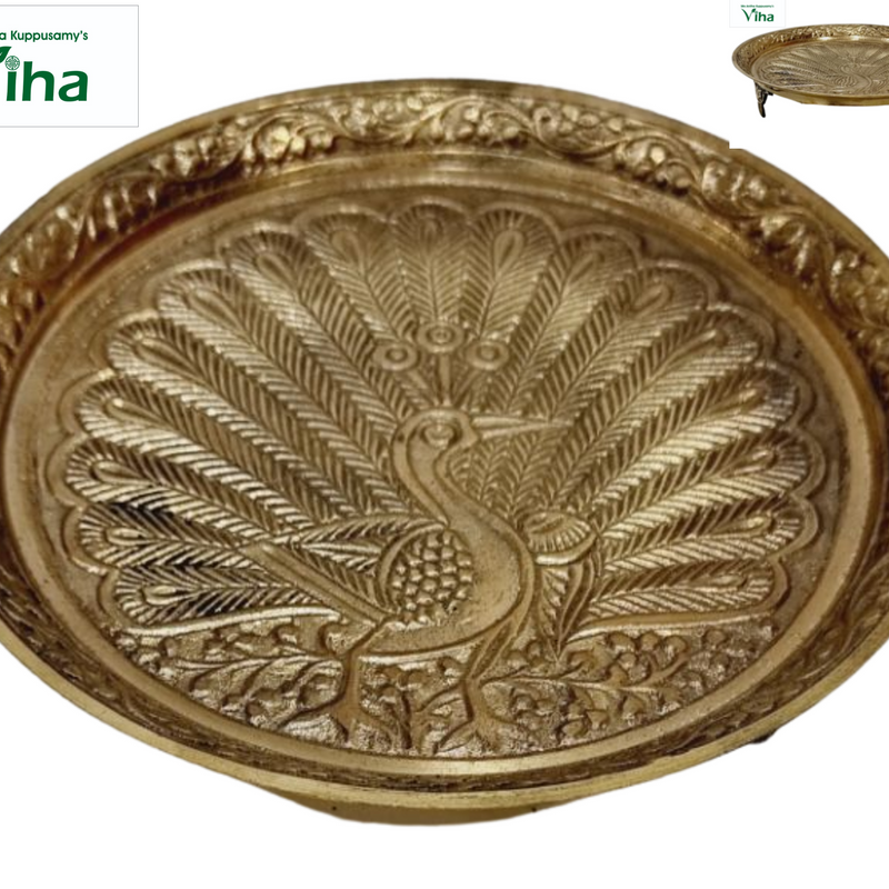 Multi Purpose Peacock Plate with Stand, brass plate with a fanned-tail peacock embossed at the centre and foliage border