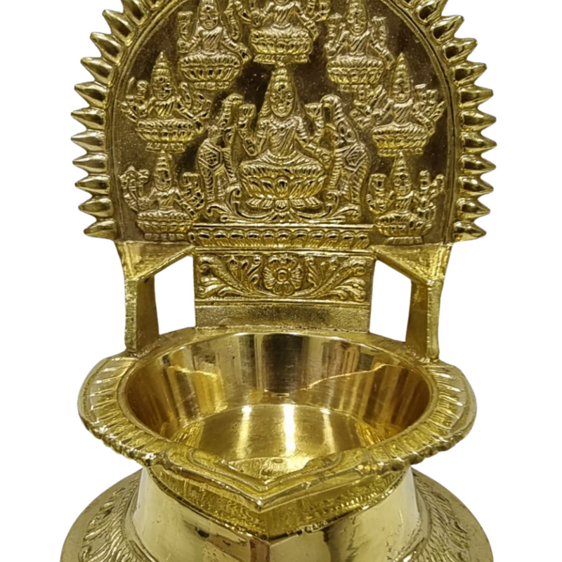 Ashtalakshmi vilakku in brass, arched panel of eight seated Lakshmi figures above a leaf-shaped oil bowl