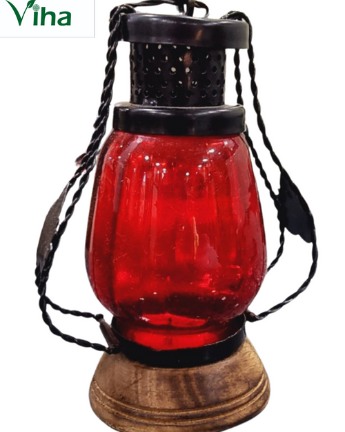 Red Electric Lantern, a red glass lantern on a brown wooden base with black metallic top and side frames