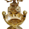 Varahi Amman vilakku, seated multi-armed figure above a deep brass oil bowl flanked by lion heads