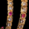 Impon Bangles, a pair of gold-toned bangles with alternating clear stones and round red stones