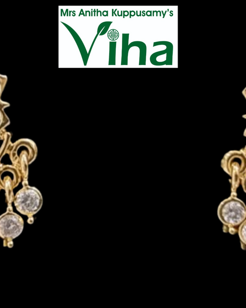 Impon Studs with a floral cluster, dangling pendants and pink center stones