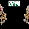 Impon Studs with a floral cluster, dangling pendants and pink center stones
