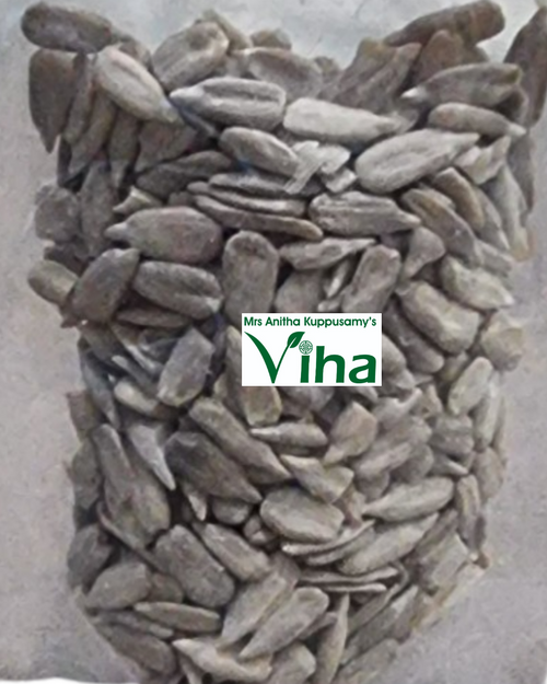 Sun Flower Seeds for Eating, a pile of greyish-brown elongated teardrop-shaped seeds with matte texture against a grey background