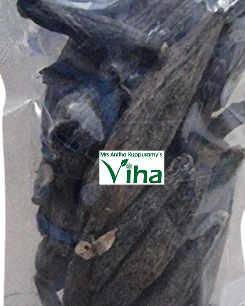 Marathi Moggu in a clear plastic pouch containing dark pods