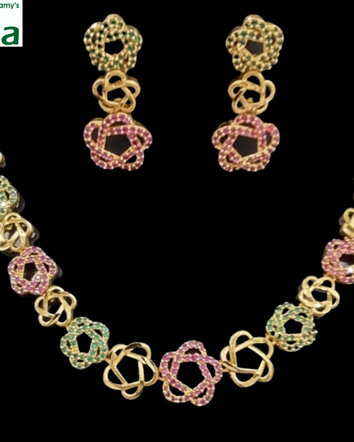 Impon Necklace Set with flower motifs and matching drop earrings