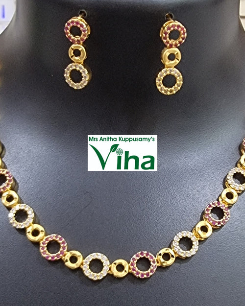Impon Necklace Set with circular linked motifs and matching earrings