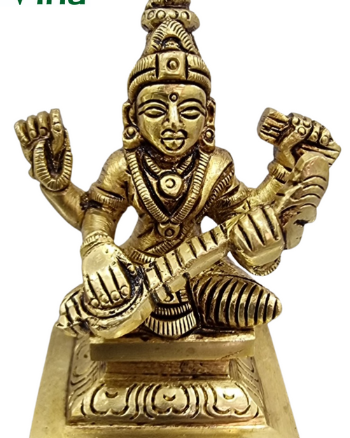 Saraswathi in brass, four-armed figure seated on a square stepped base with a tall crown and arms raised