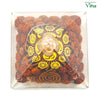 Rudraksha 7 Chakra Pyramid, smooth clear pyramid filled with textured brown beads, a central yellow symbol wheel, and copper-toned wire coils