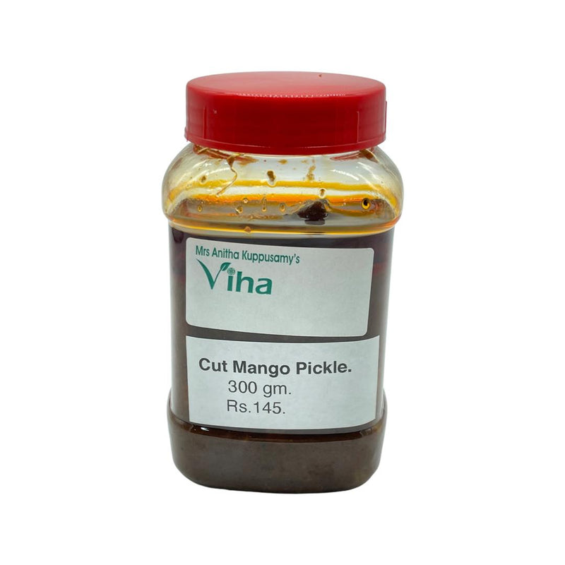 Cut Mango Pickle, squat translucent clear glass jar with a red screw lid
