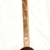Thaalipu Karandi, a brown metal ladle featuring a long, flat handle with a hooked top and a deep, circular bowl at its base