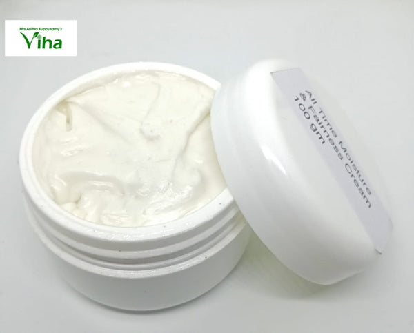 Moisture & Fairness Cream, an open white jar filled with white cream features a separate white lid beside it displaying a text label