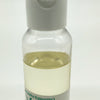 Argan Oil - Organic, a clear bottle filled with yellow liquid, topped with a white flip-top cap, features a label at the bottom with green and black text