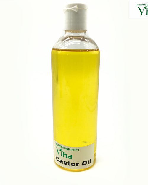 Castor Oil, a tall clear plastic bottle filled with yellow liquid, featuring a white flip-top cap and a white label near the base