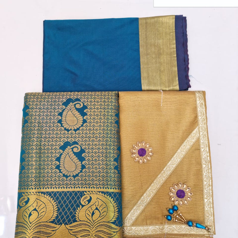 Apoorva Silk Half Saree Set, folded blue fabric, blue fabric with gold-toned motifs, and gold-toned fabric with two purple flowers