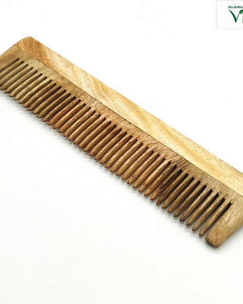 Neem Wood Comb, a brown wooden comb featuring forty-two teeth and a polished matte finish