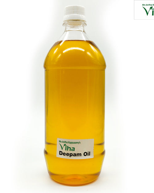 Viha's Pure Deepam Oil, a tall, clear plastic bottle filled with yellow liquid, featuring a white cap and a rectangular label near the base