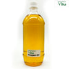 Viha's Pure Deepam Oil, a tall, clear plastic bottle filled with yellow liquid, featuring a white cap and a rectangular label near the base