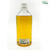 Viha's Pure Deepam Oil, a clear glass bottle filled with yellow liquid, topped with a white cap and bearing a white rectangular label near its base