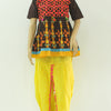 Traditional Kath-Putli Kedia and Tulip Pants, with embroidered geometric patterns and pom-pom trim