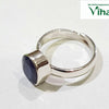 Blue Sapphire Ring Silver Oval Cut Adjustable, a shiny silver-toned ring featuring a large faceted dark blue stone