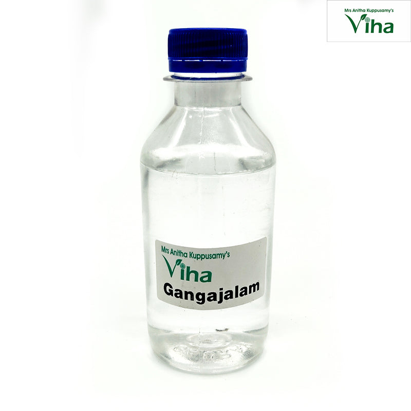Pure Gangajalam, a clear bottle with a ribbed blue screw cap, filled with transparent liquid, bearing a white label displaying black and green lettering