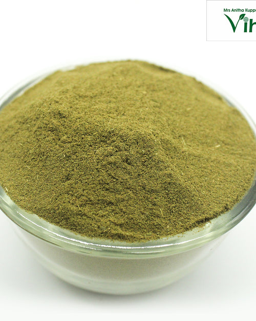 Herbal Hair Wash Powder, a round, transparent glass bowl filled to the brim with fine, powdery, olive-green matter