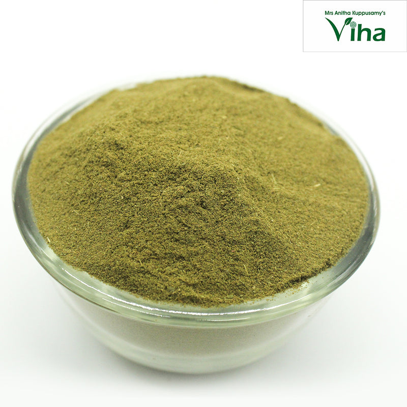 Herbal Hair Wash Powder, a round, transparent glass bowl filled to the brim with fine, powdery, olive-green matter