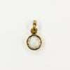 Pearl Ganesha Brass Pendant with a metal frame and a carved white inlaid centerpiece