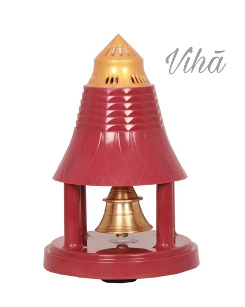 Automatic Electronic Pooja Bell, a shiny red and gold-toned plastic temple-like structure with four pillars enclosing a suspended bell