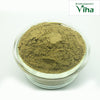 Bhringraj Powder / Karisalankanni Keerai Powder, a round, clear glass bowl holding fine, textured green powder mounded high