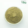 Bhringraj Powder / Karisalankanni Keerai Powder, a round clear glass bowl filled with fine greenish-brown powder