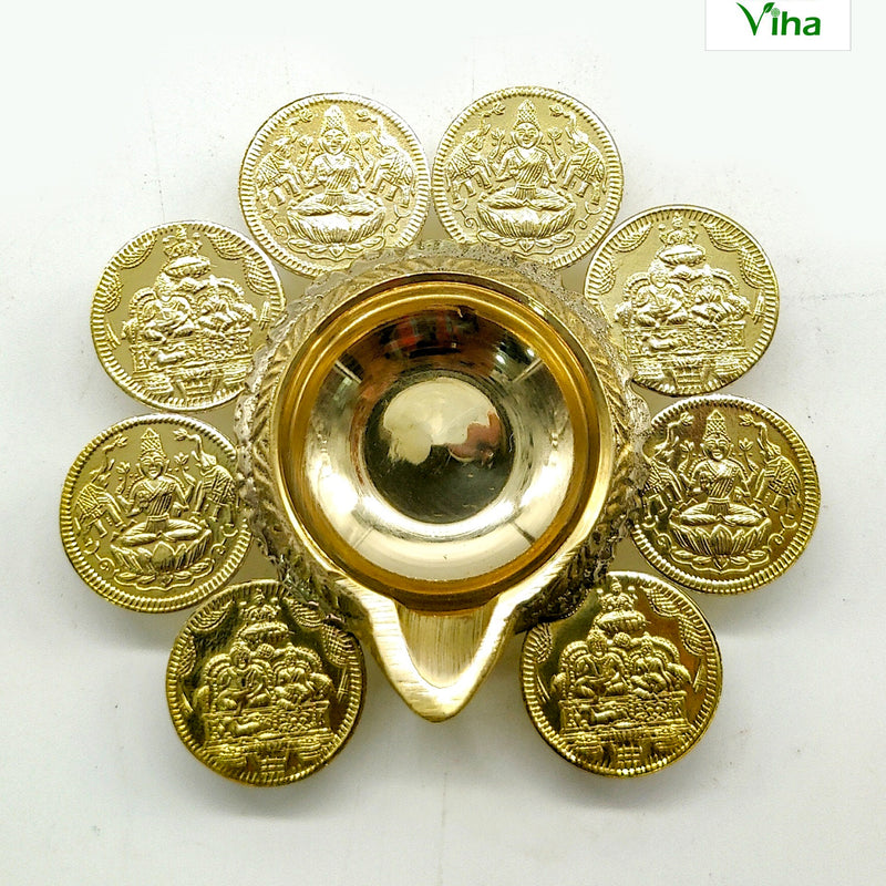 Brass Aishwarya Lakshmi Kubera deepam, central oil bowl ringed by eight embossed Lakshmi coins