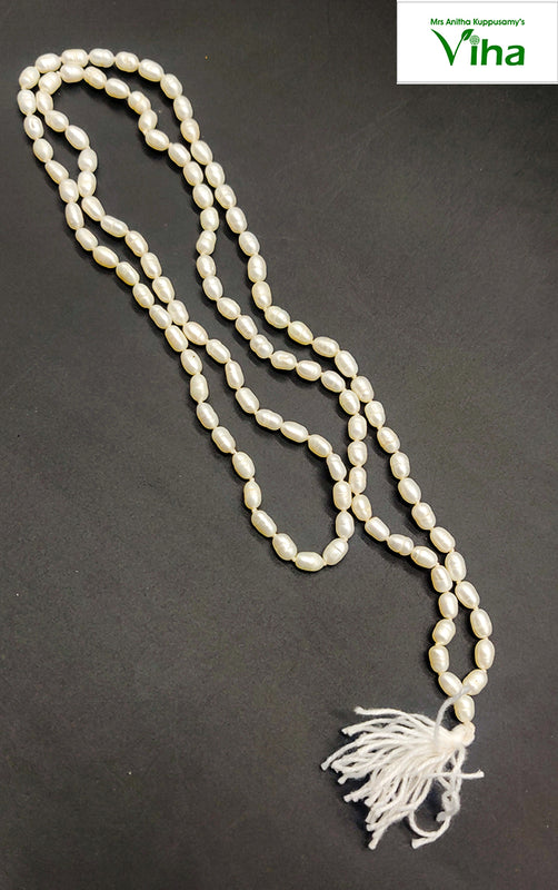 Original Pearl Mala For Men & Jap, a long strand of glossy, off-white, oblong beads with a matching white tassel at the bottom