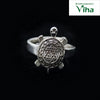 Silver Tortoise Ring Adjustable, a silver-coloured metal ring featuring a turtle top with a geometric hexagram pattern on its shell