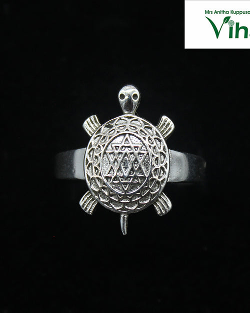 Silver Tortoise Ring Adjustable, circular band with a turtle-shaped ornament on top
