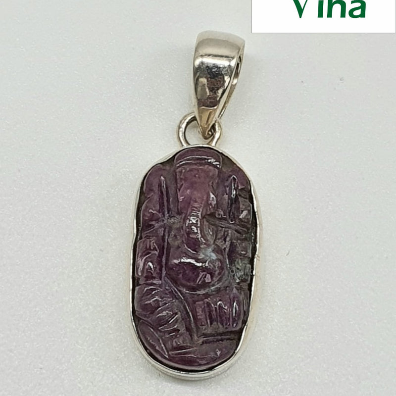 Ruby Ganesha Silver Pendant with carved stone face and metal bail