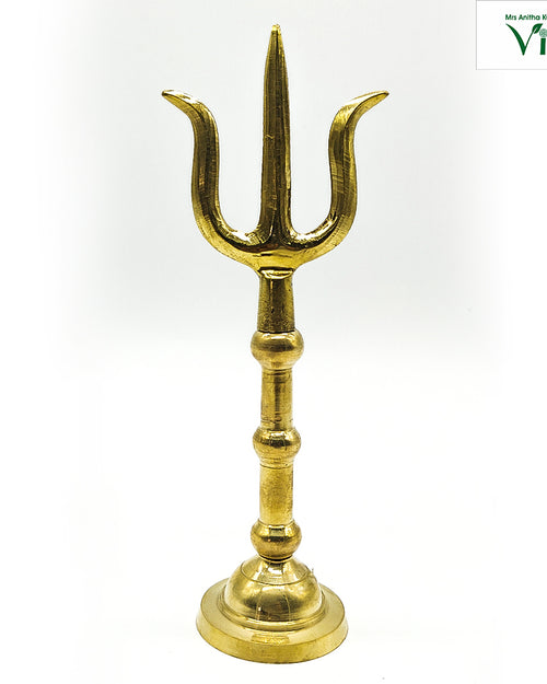 Thirisoolam Brass / Trishul / Trishool, a shiny gold-toned trident sculpture featuring three upward prongs and three bulbous rings on the stem