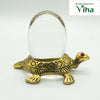 Tortoise Sphatik Ling (Kachua) with a turtle carrying an oval sphere and red stone eyes