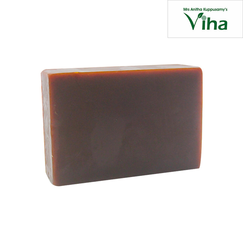 Turmeric Soap, a single rectangular brownish bar with rounded corners and a smooth matte surface