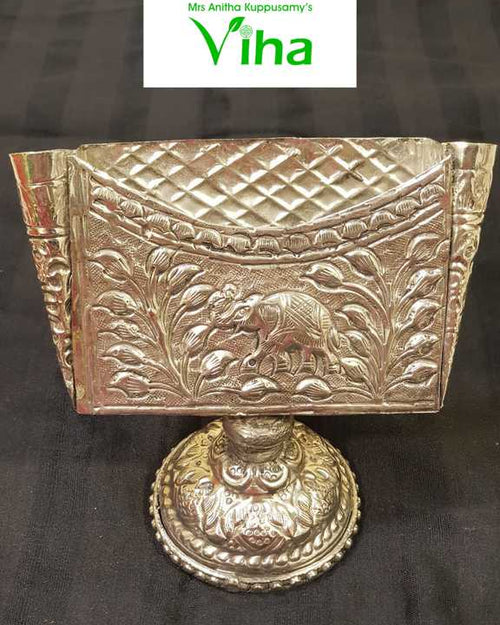 Visiting Card Holder, a silver-toned metal container with embossed elephant and floral motifs on a round pedestal base