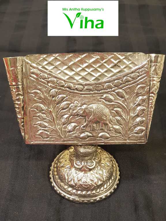 Visiting Card Holder, a silver-toned metal container with embossed elephant and floral motifs on a round pedestal base